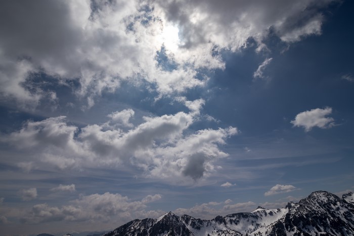 4K Sky Blue Clouds Over Snow Mountains