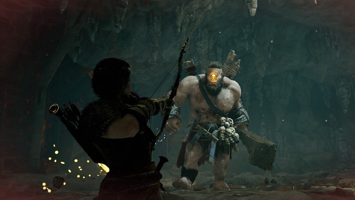 Kassandra from Assassins Creed: Odyssey fighting a cyclops