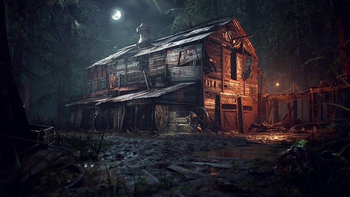 Old wooden barn in a dark forest at night