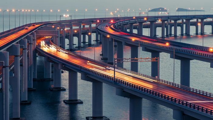 Dalian Bridge with light trails at dusk