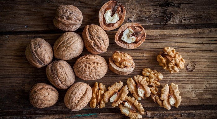Walnuts on a wooden surface