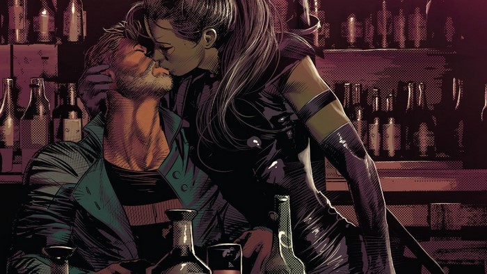 Domino and Cable kissing in a bar