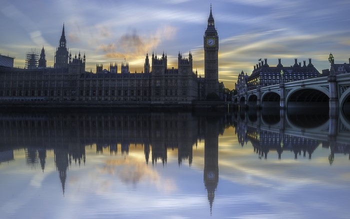 Palace of Westminster and Big Ben reflected in River Thames