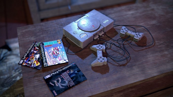 PlayStation console with games and controllers