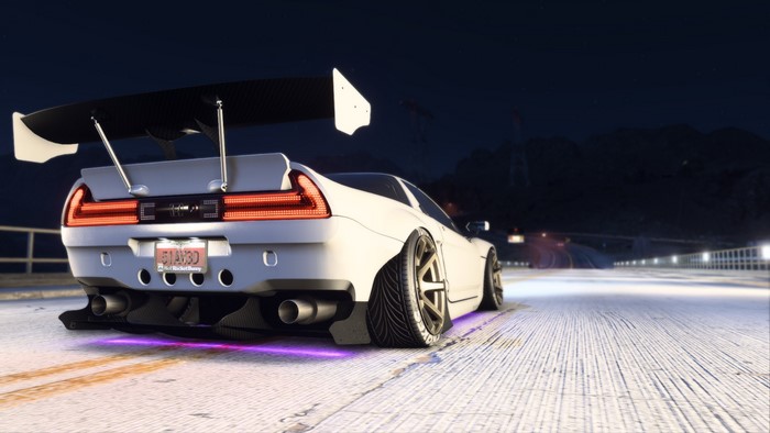 White Honda NSX with Rocket Bunny kit and large spoiler