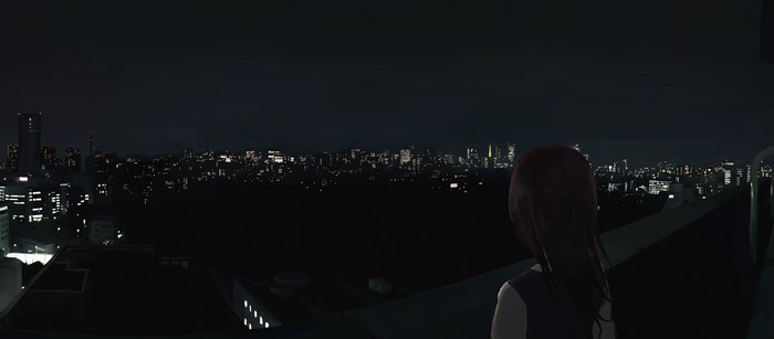 Girl on a rooftop overlooking a city at night