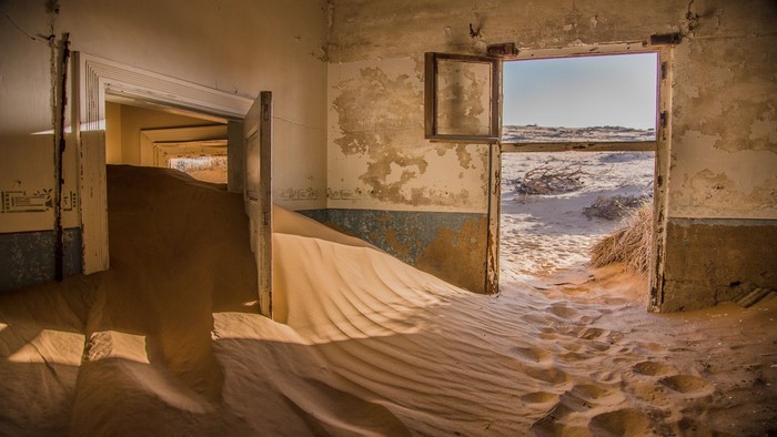 Abandoned house filled with sand in Namibia