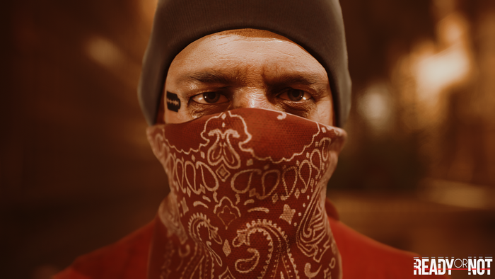 Man with bandana and razor tattoo from Ready or Not