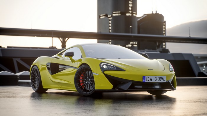 Yellow McLaren sports car with license plate DW 209AJ