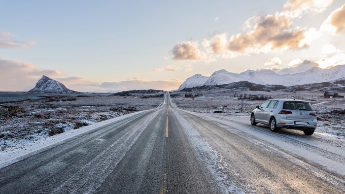 4K Lofoten Islands Norway road with car and mountains