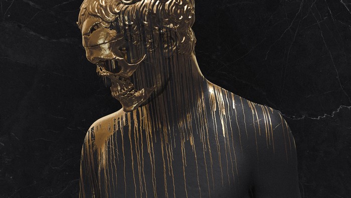 Gold sculpture of a skull with dripping gold