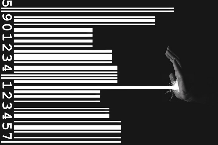 Barcode with hand and sparks