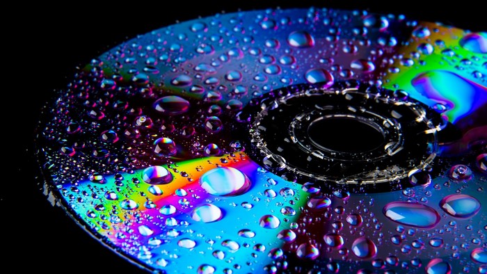 Water drops on a colorful CD