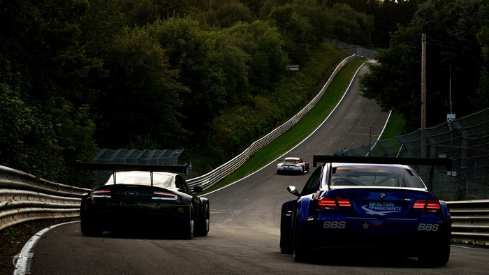 Aston Martin, BMW, and Porsche race cars on Nürburgring