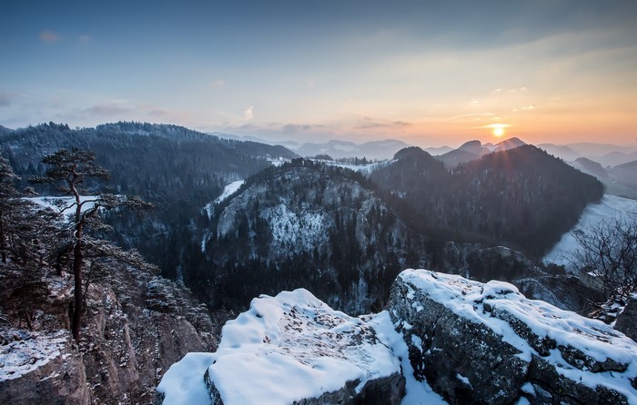 Snowy mountains landscape at sunset