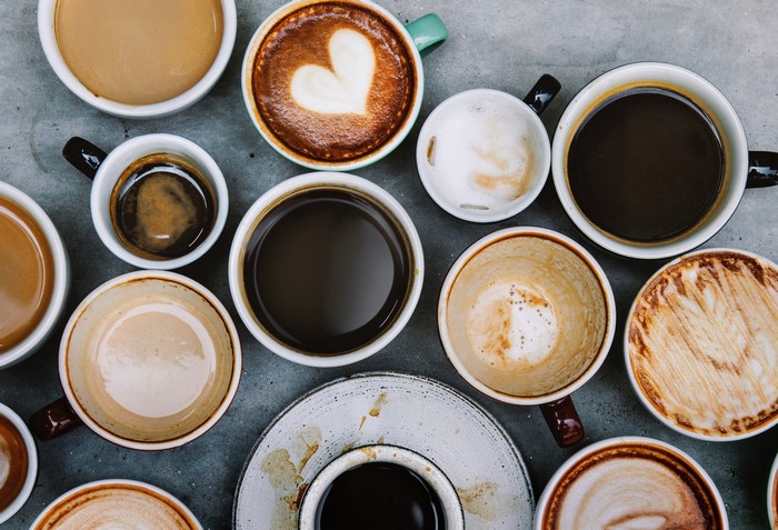 Assortment of coffee cups with various coffee drinks