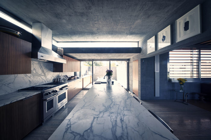 Modern concrete and marble kitchen interior