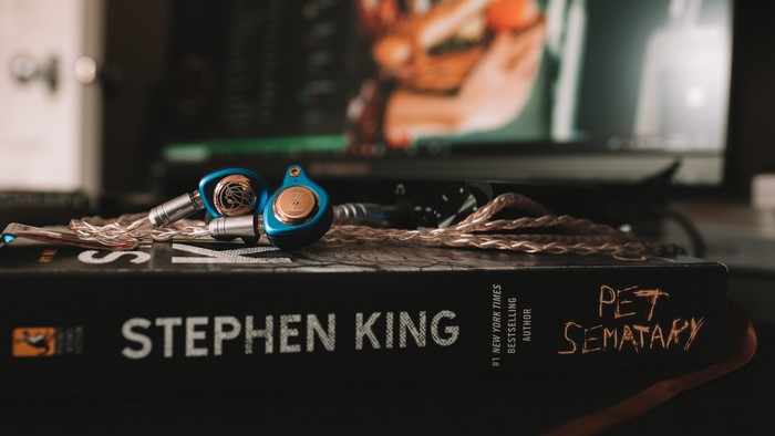 Stephen King's Pet Sematary book with earphones