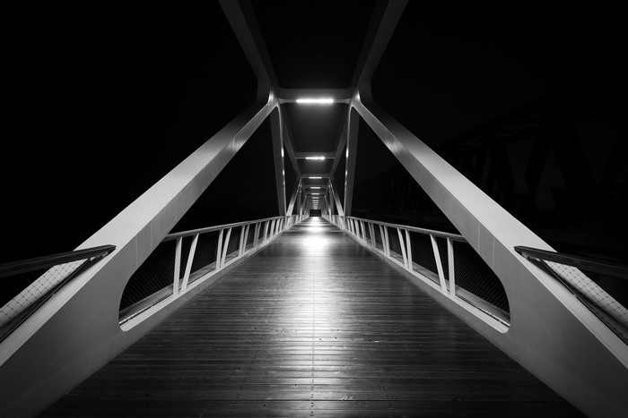 Symmetrical bridge at night