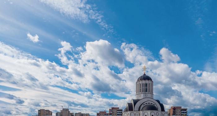 Cathedral in Romania under a cloudy sky