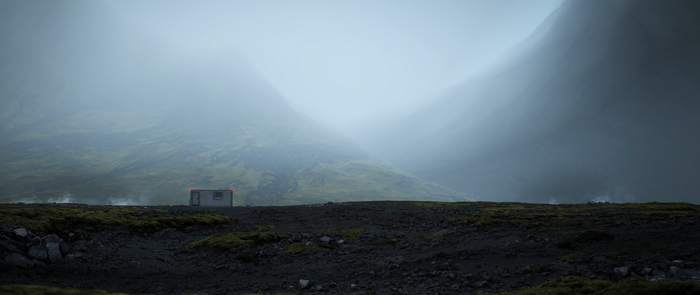 Small building in misty mountains landscape