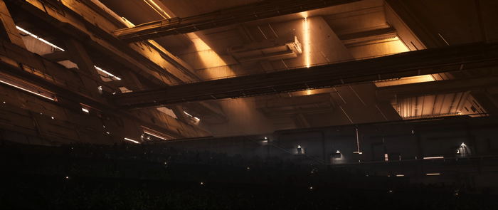 Interior of a large building with plants and lights