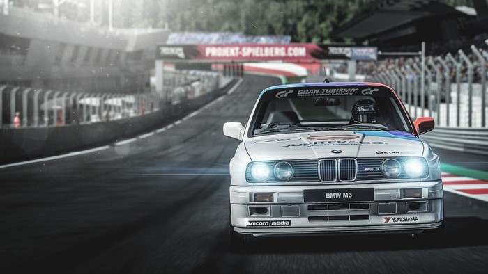 White BMW M3 race car on a track