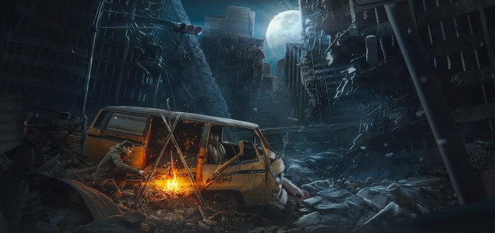 Man by fireplace in ruined city at night