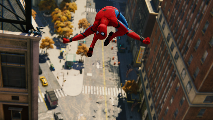 Spider-Man leaping between buildings in a city