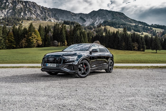 Black ABT Audi Q8 in a mountain landscape