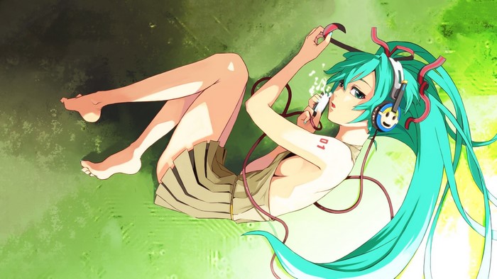 Hatsune Miku from Vocaloid lying down with headphones