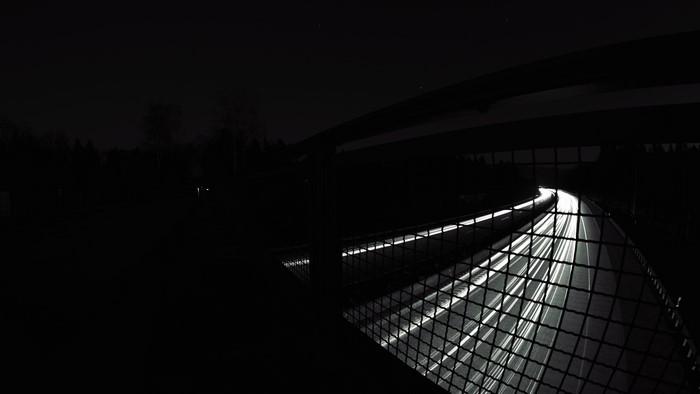 4K monochrome long exposure of a highway at night