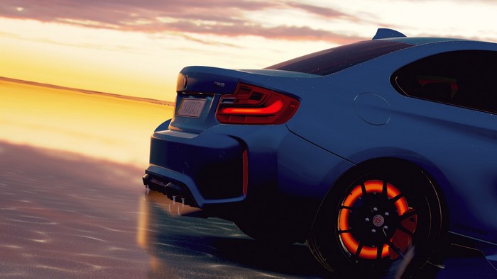 Blue BMW M2 with glowing brakes on wet surface