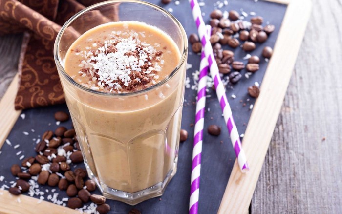 Coffee smoothie with coconut and chocolate shavings