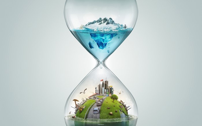 Hourglass with melting iceberg and city landscape