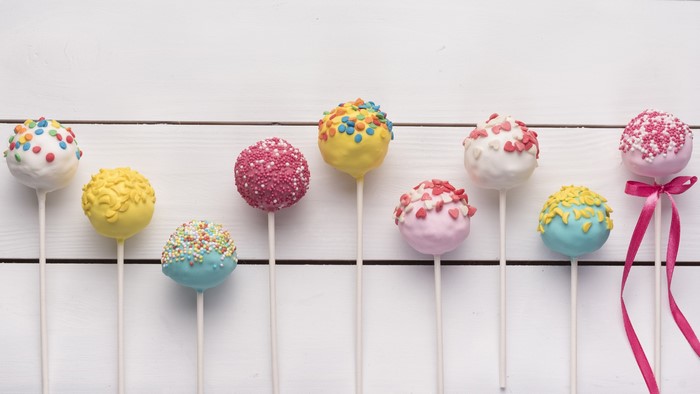 Colorful cake pops with sprinkles and decorations