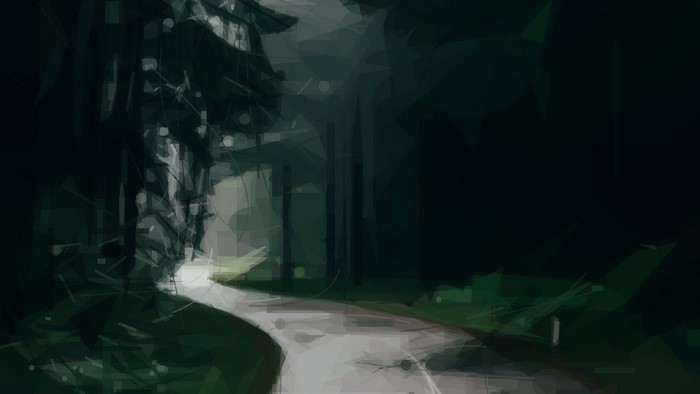 A winding road through a dark forest