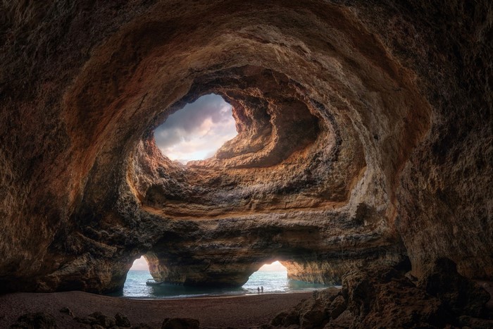 Cave opening with view of the ocean and sky