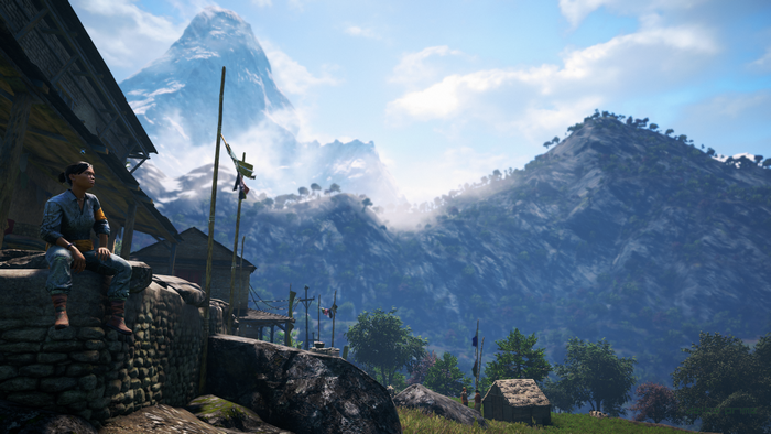 Woman in village with mountains in background, Far Cry 4