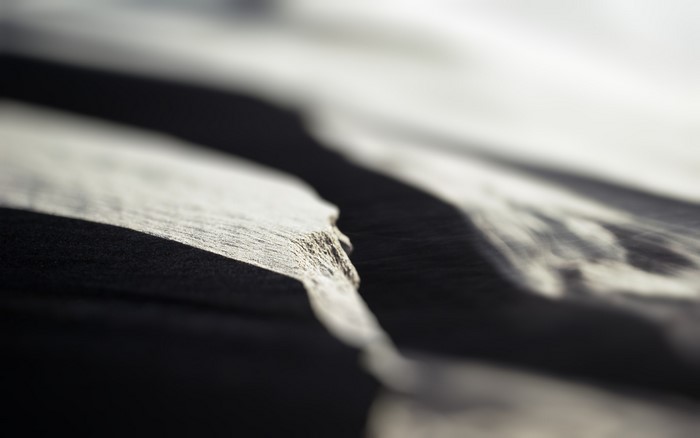 Monochrome macro texture of sand dunes