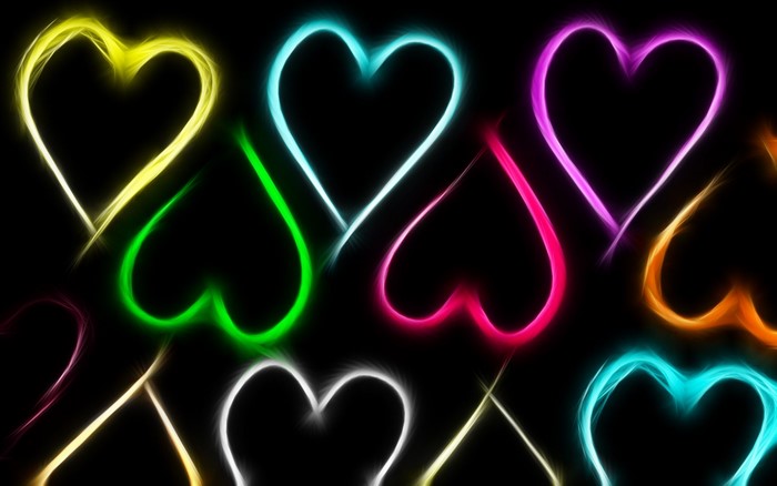 Colorful neon hearts on a black background