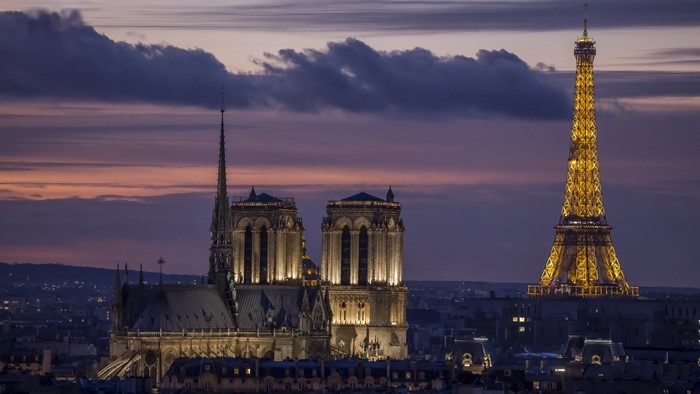 Notre-Dame Cathedral and Eiffel Tower at sunset in Paris