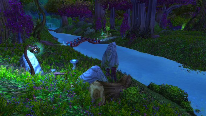 Ashenvale forest with a river and bridge in World of Warcraft