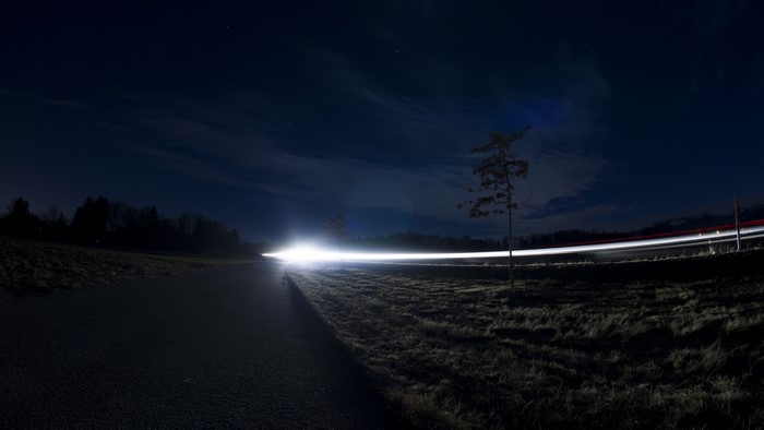 Long exposure of car lights on a road at night