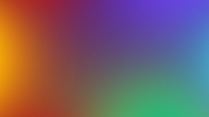 Abstract gradient of orange, purple, and green colors