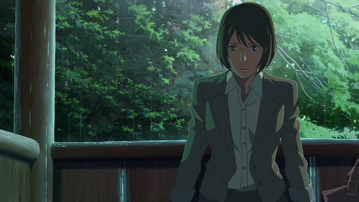 Woman in suit in the rain