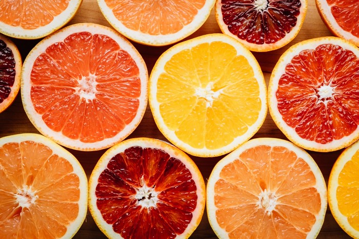 Assortment of sliced citrus fruits