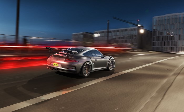 Porsche 911 GT3 RS driving at night with motion blur