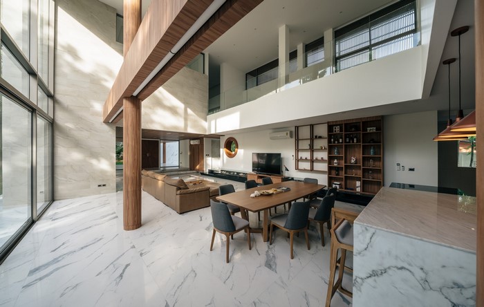 Modern living room with dining table and sectional sofa
