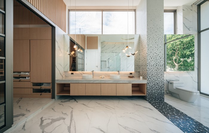 Modern bathroom with double vanity and large mirror